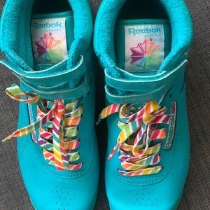 Woman’s Vintage Reebok Freestyle Hi top sneakers